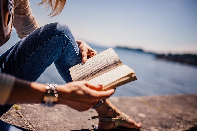 woman reading book